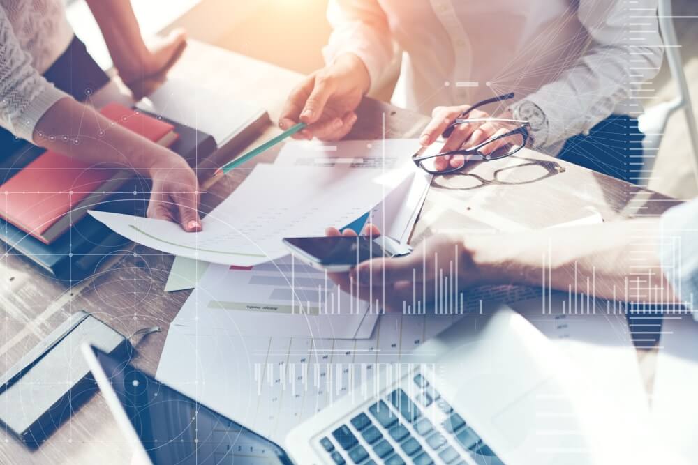 people working and collaborating together to reach a goal